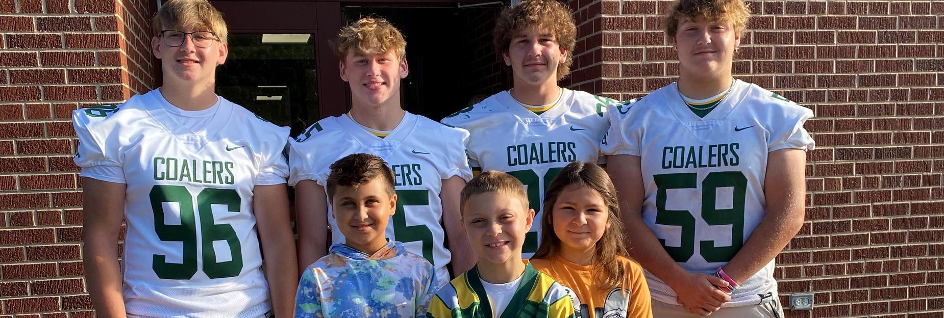 Football players with ES students