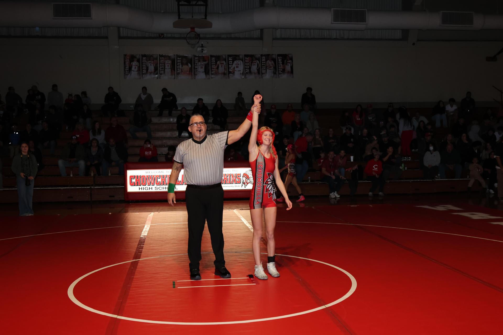 Wrestling winners with hands up 3