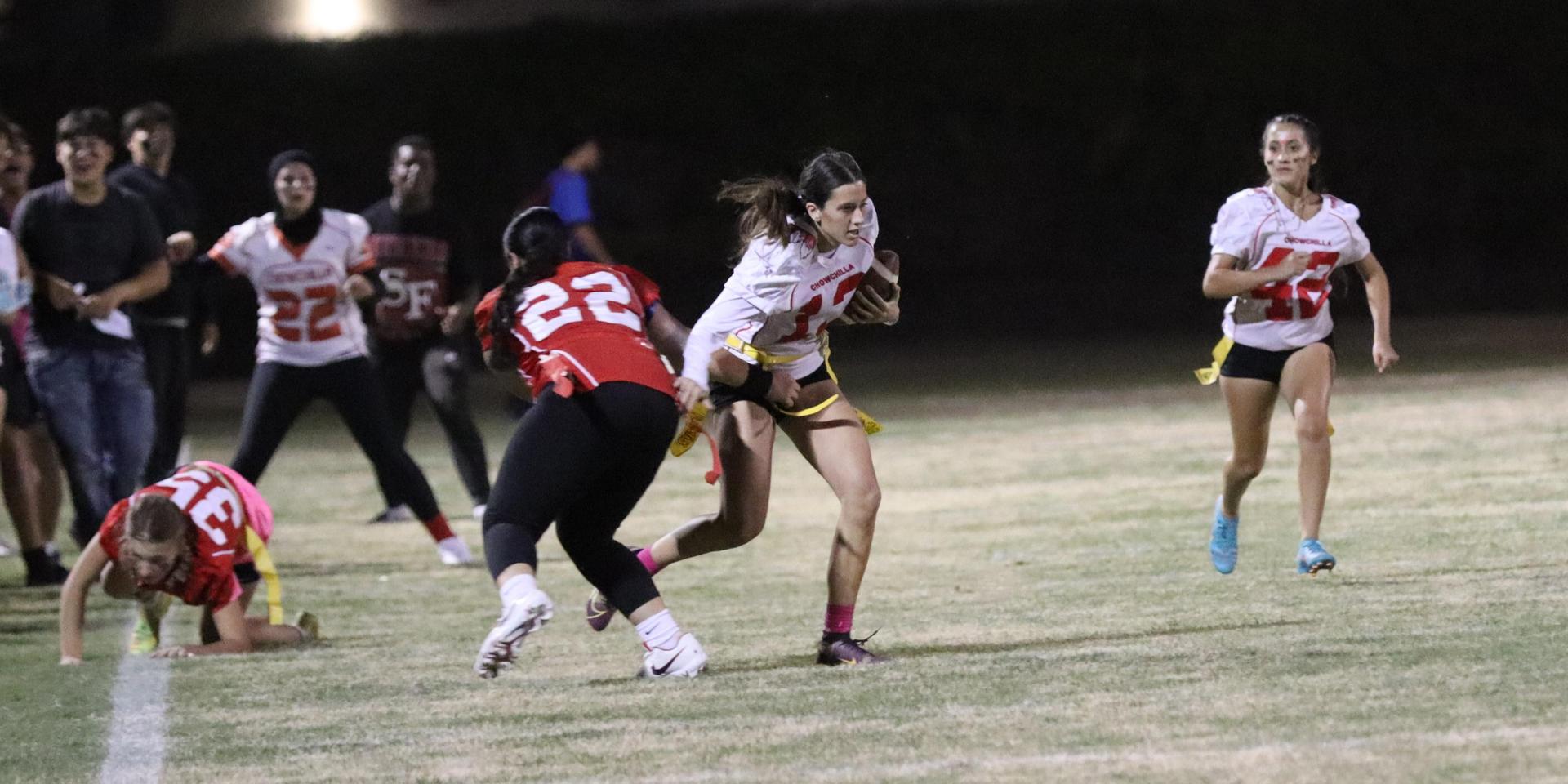 girls playing flag football