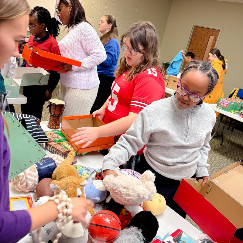 Students packing boxes