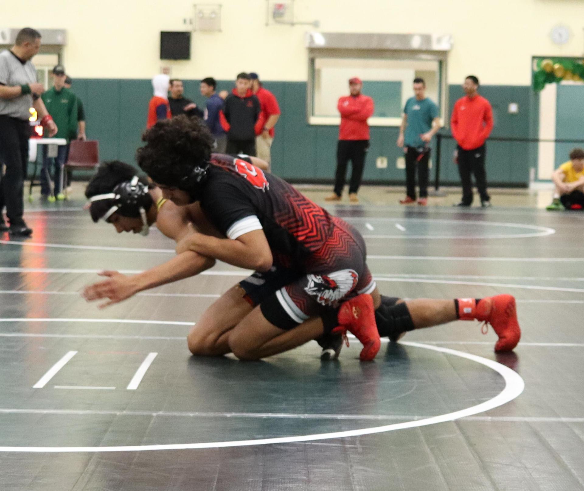 wrestlers in action at the Hawks invitational