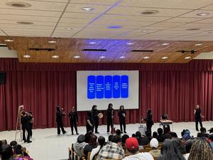 Students acting and dancing for Kendrick Lamar