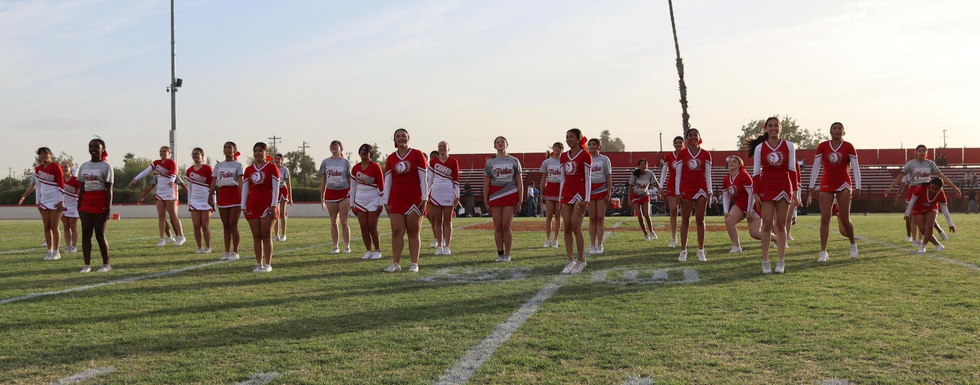 Cheerleaders performing at the football game