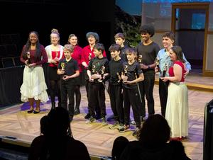 Performers with the other groups on stage