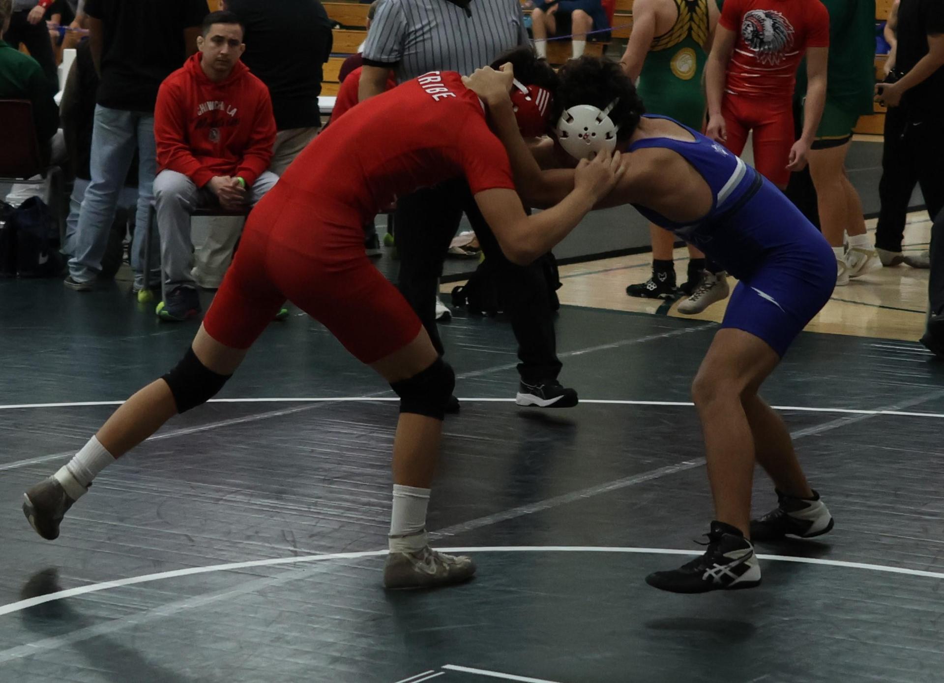 Boys wrestling in the Liberty Duals event 102