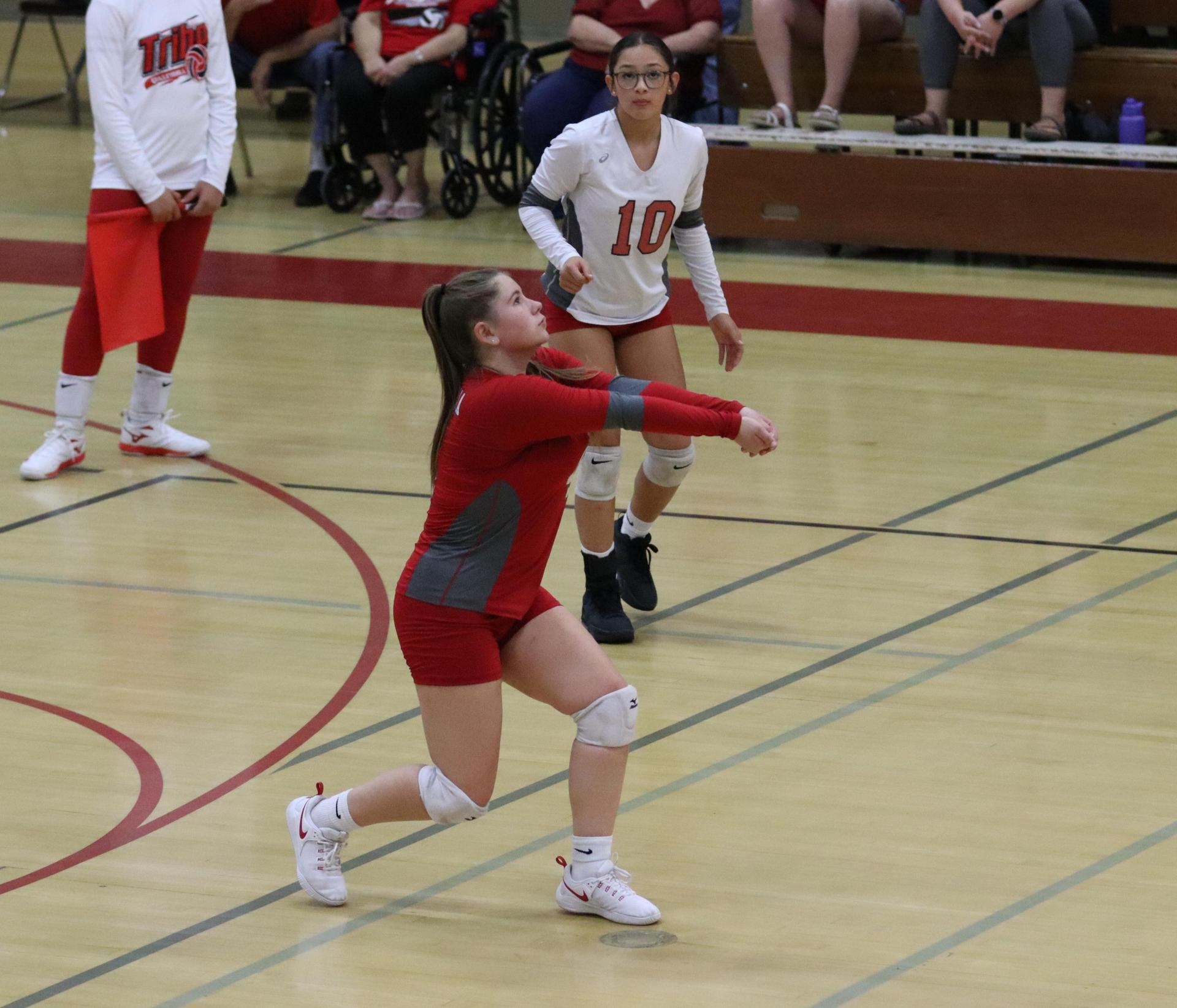 junior varsity girls playing volleyball against Liberty