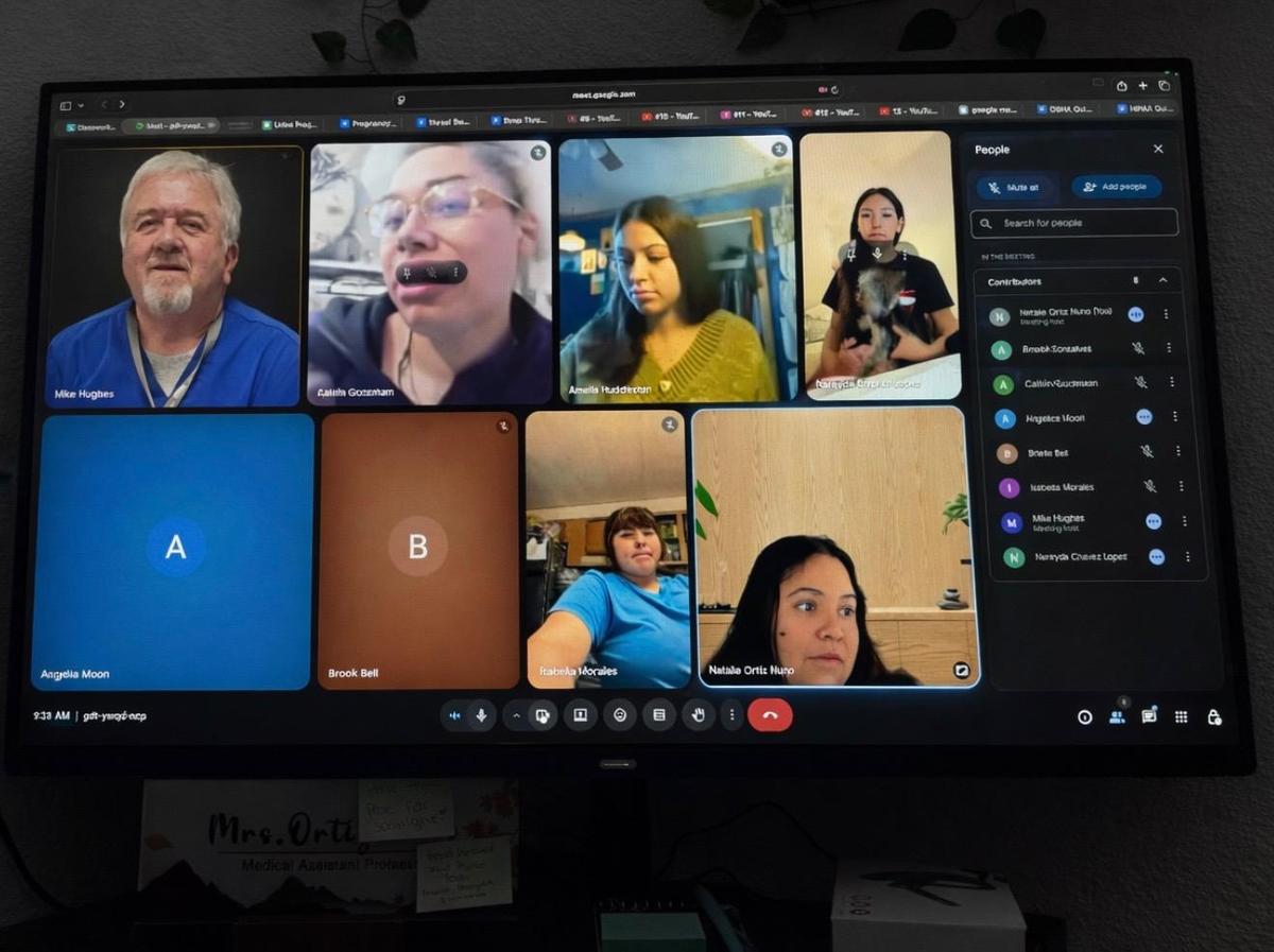 Medical Assisting Student and their Instructors in a Zoom call - photos on a computer screen
