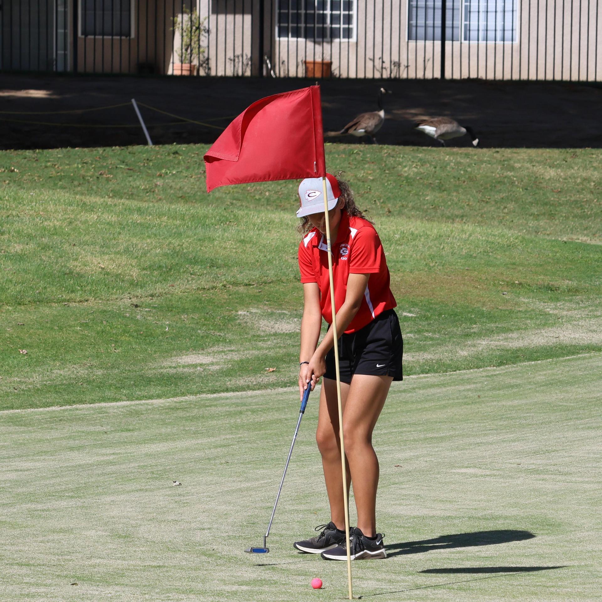 Girls golfers in action at the championships