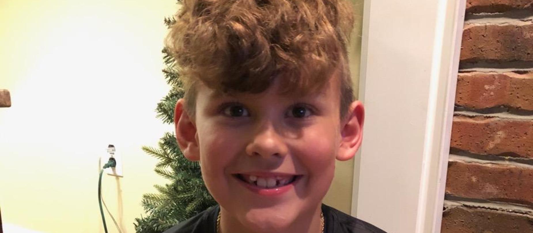 boy smiling for camera