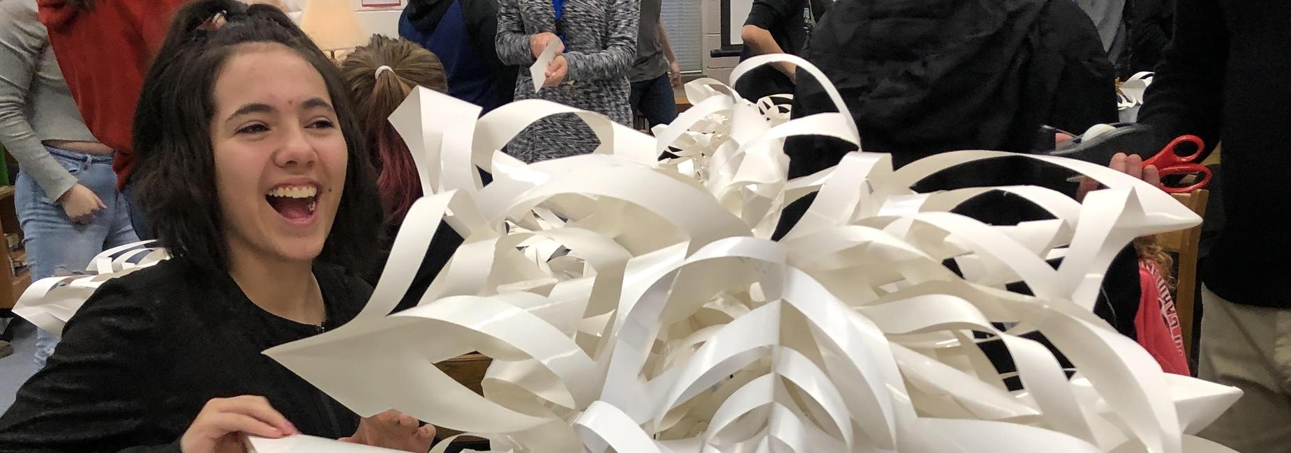 student making snowflake