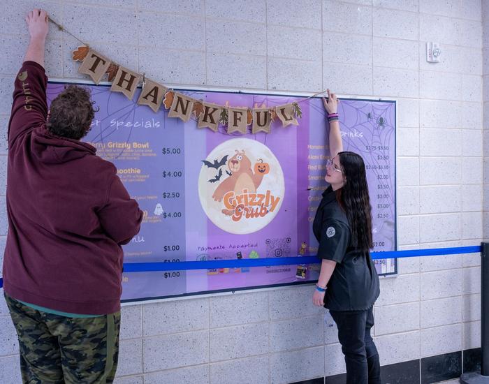 Students in their school store Grizzly Grub