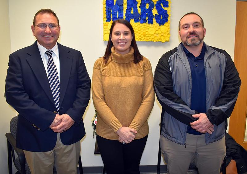 Two men and one woman