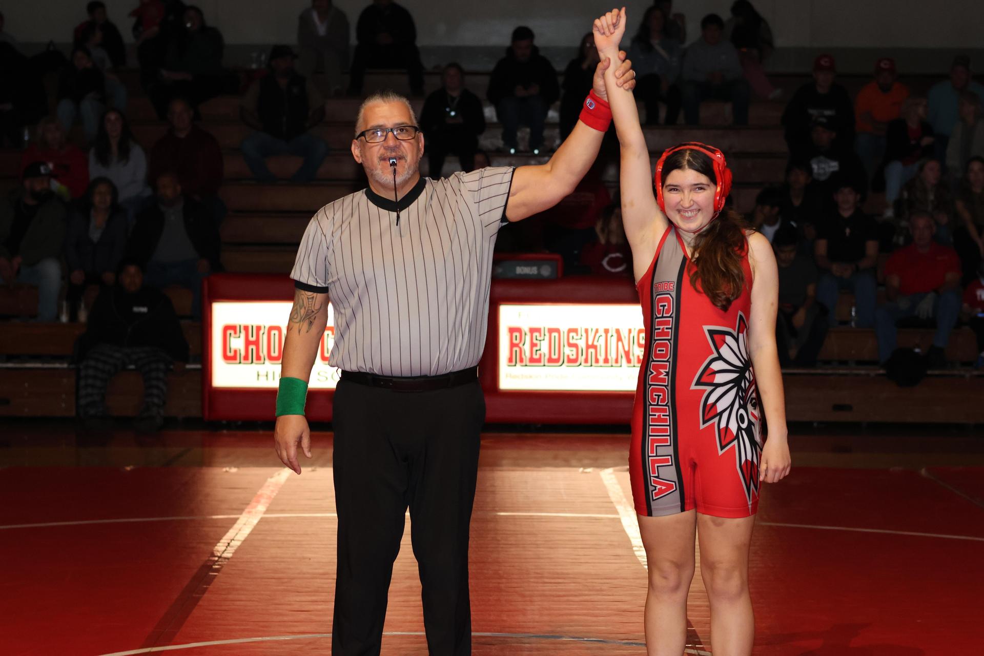 Wrestling winners with hands up 12