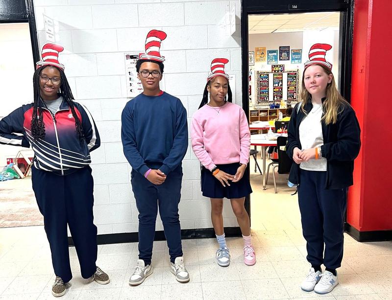 8th Grade Scholars Share the Joy of Reading During Read Across America Week Featured Photo