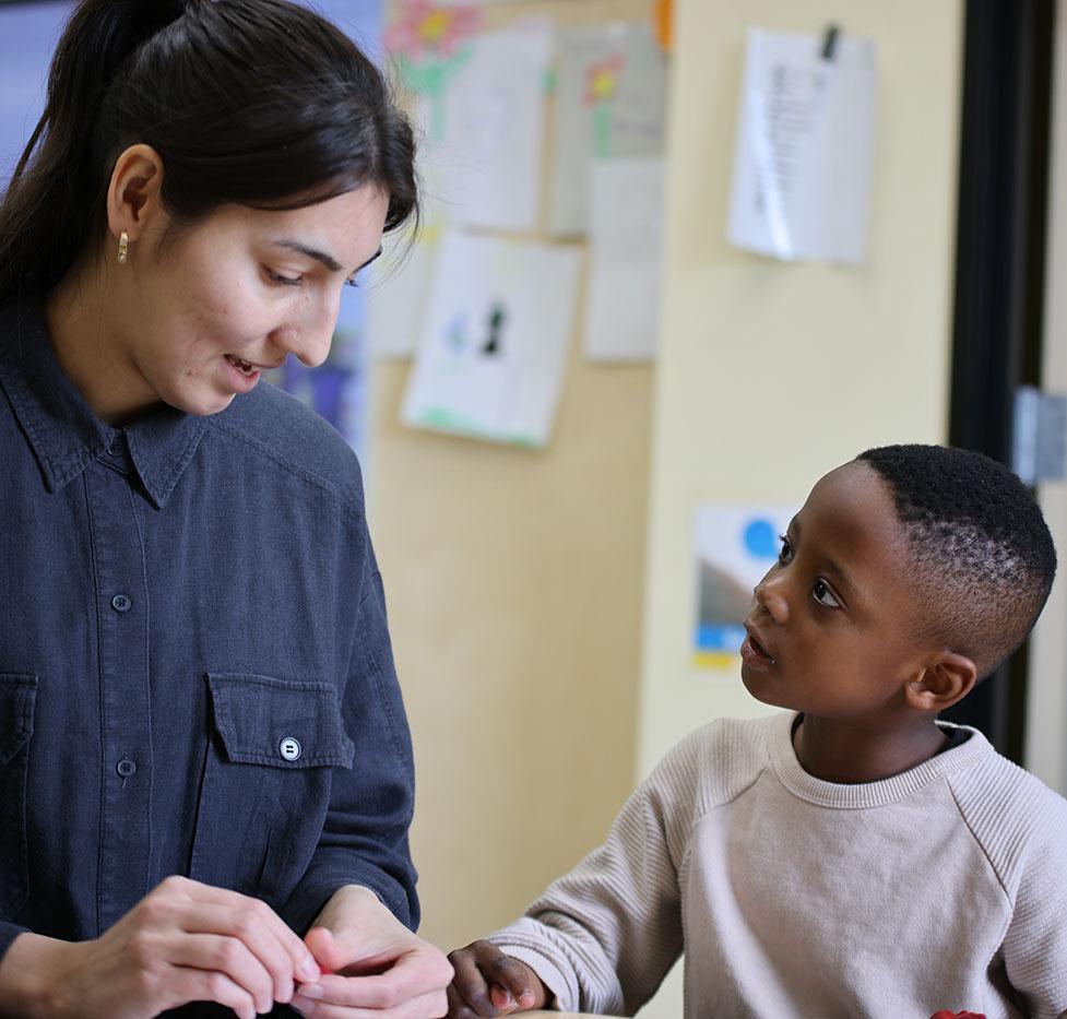 MIMMSAD pre-school student and teacher working together in the classroomo