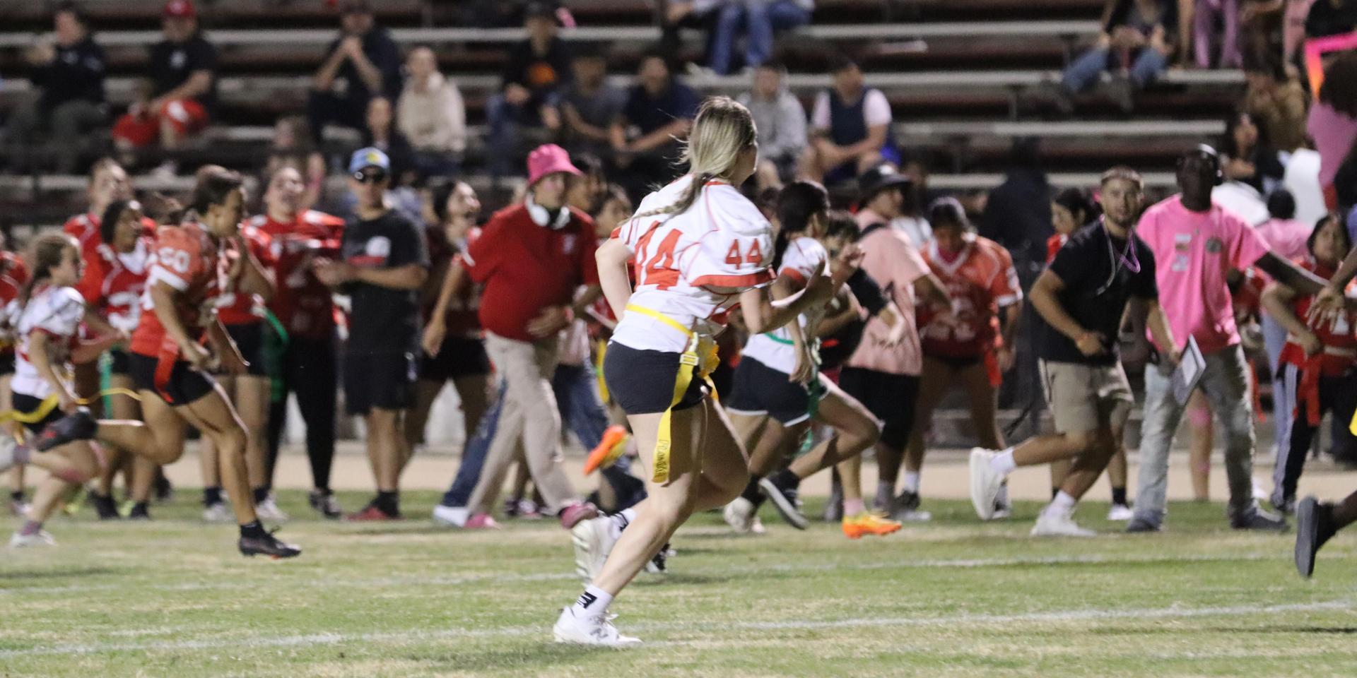 girls playing flag football