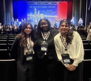 Myrapaz San Juan, Shamyia Miller, and Juliana Barrientoz pose with their medals at Regionals