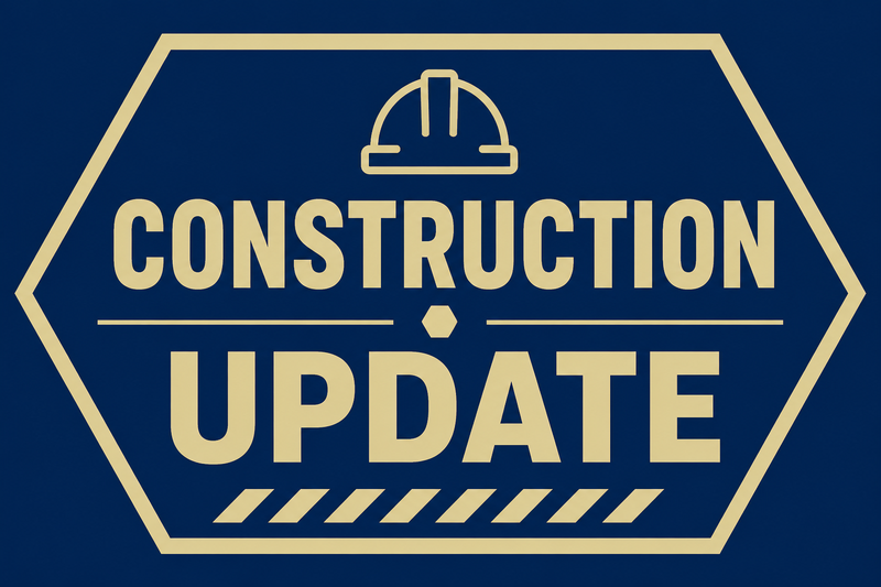 Image is on a blue background with gold font and says construction update.
