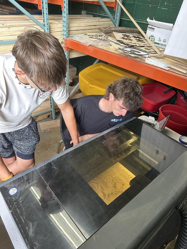 Students in Woods 3 work on senior athletic plaques