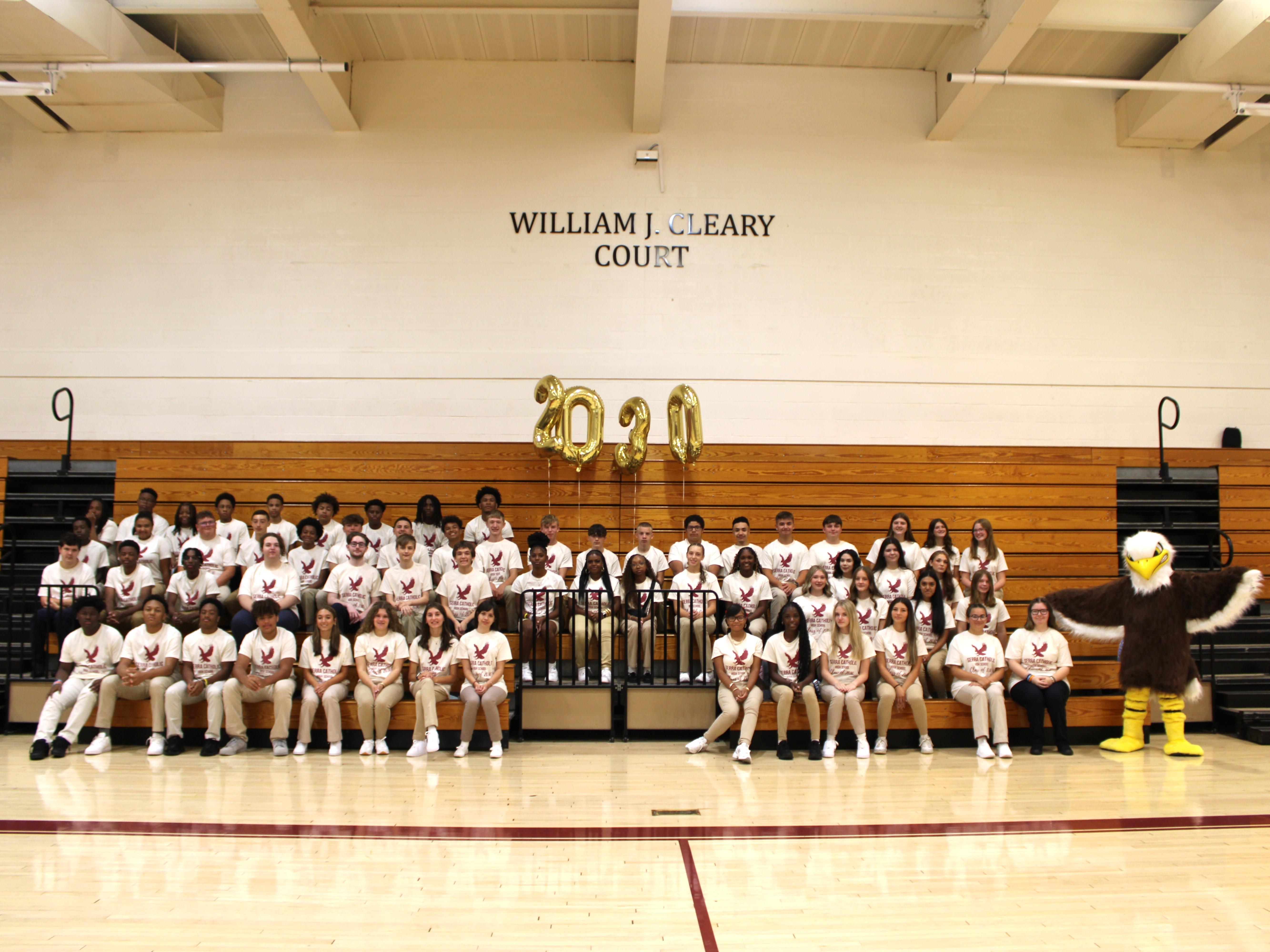 Class of 2030 First Day Group photo with Eagle
