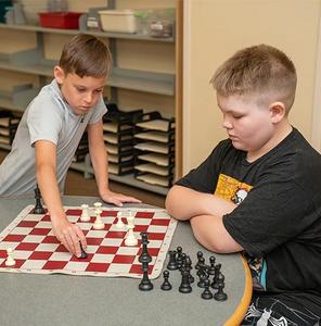 Kids playing chess