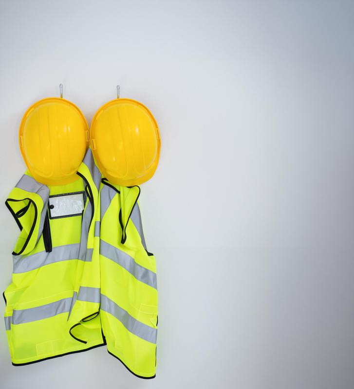 Protective workwear on wall hooks