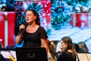 Hayden Crum sings with the band