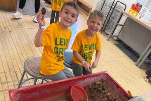 Level Green Elementary kindergarteners Remmy Staiger and Luka Rittenour spend time at the clay station