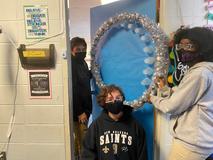 Students working on Christmas door decorations