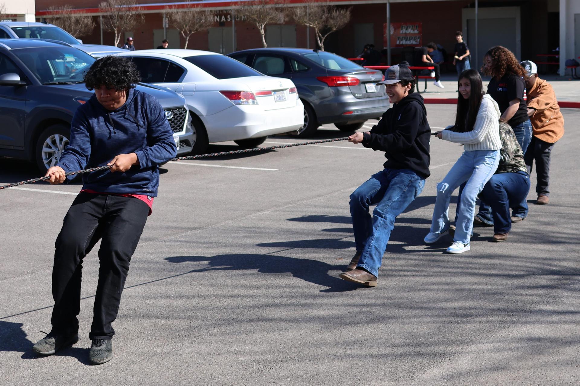 students and staff enjoying the truck pull