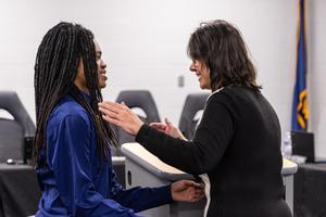 Xaiveyon presented with award by county council officer