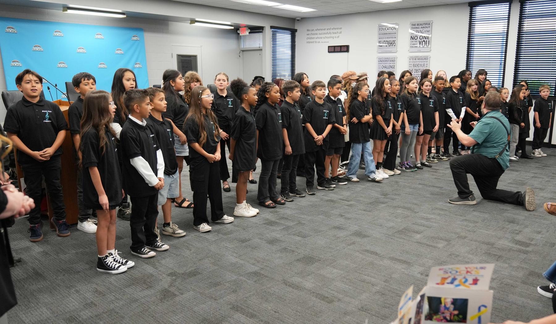 Megan Cope Elementary choir at Board Meeting