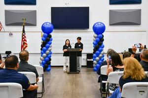 Band President Nicholas Yu and Orchestra President Ella Shih deliver a speech on behalf of the student body.