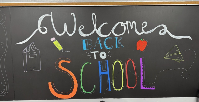 Welcome sign on a chalkboard.