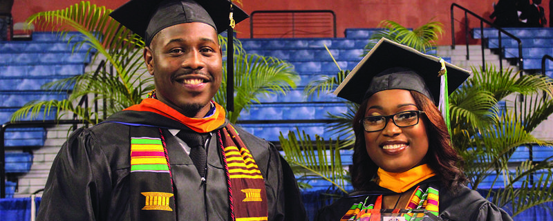 Monte'Yiona Jones and Rayshun Inman receive the president's Second Mile Award