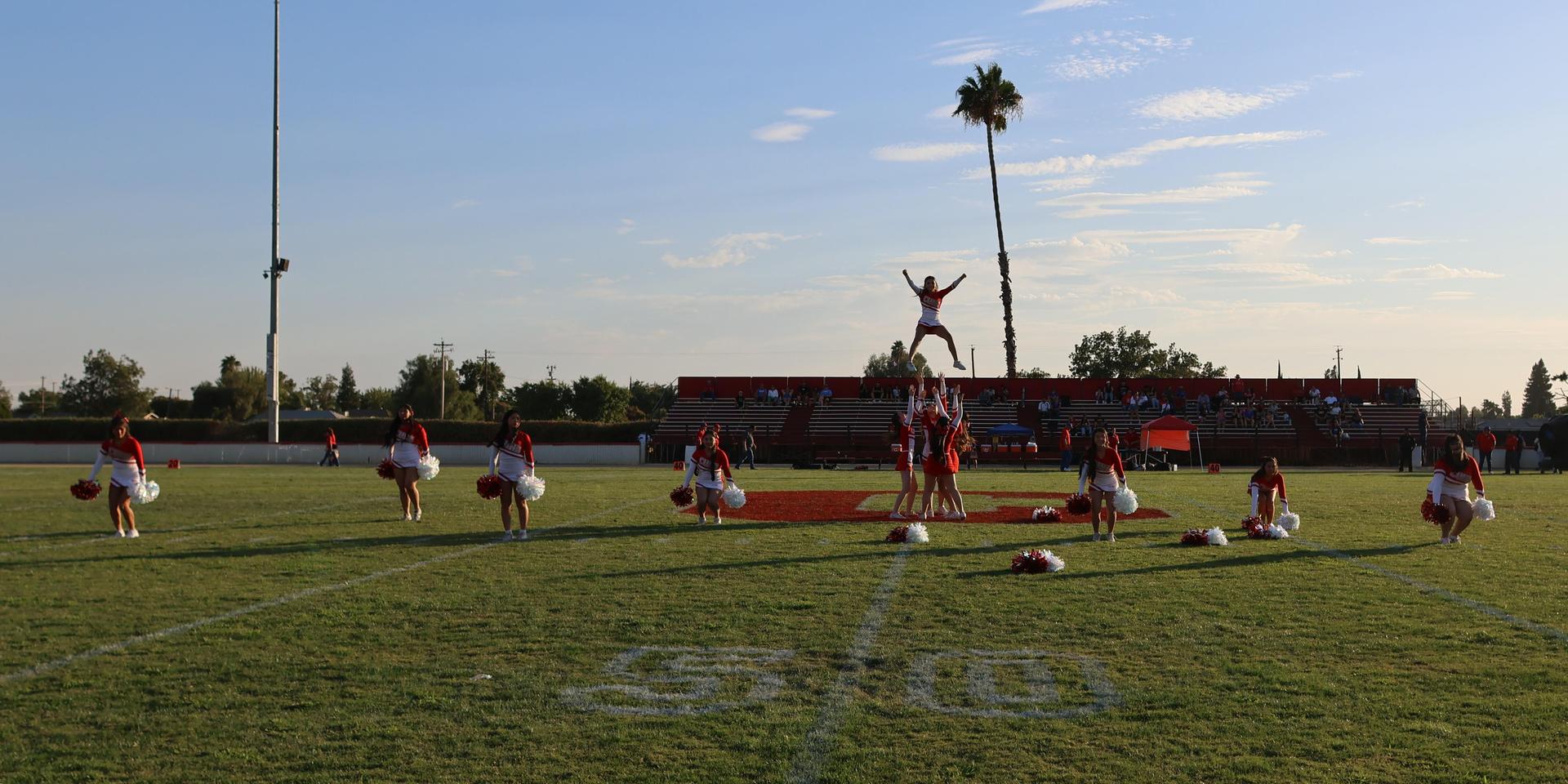 Junior Varsity Cheerleaders in action at halftime 3