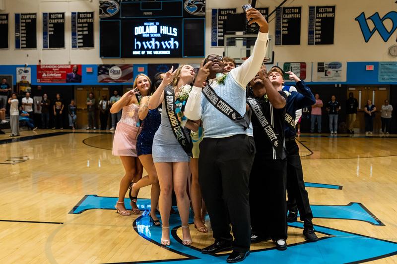 The homecoming court poses for a selfie