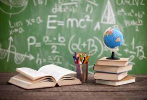 chalkboard with textbooks