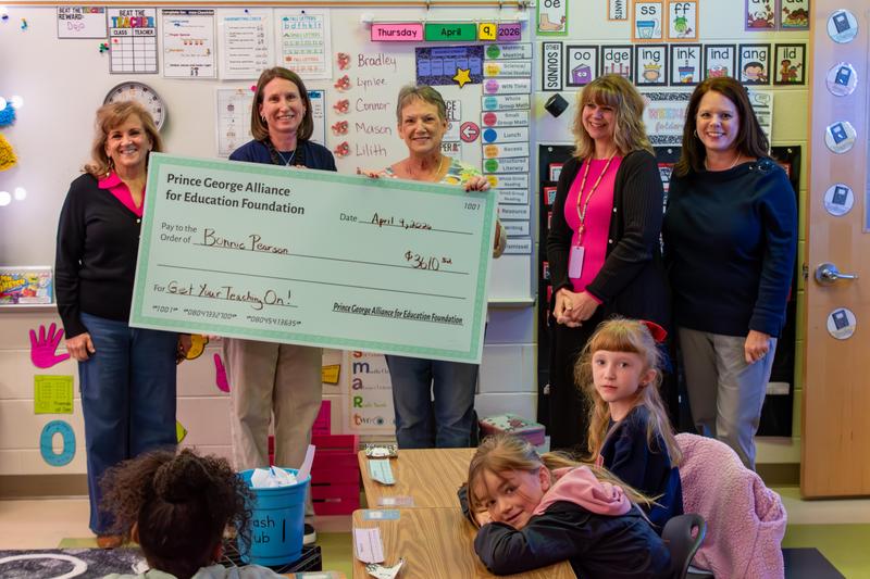 Ms. Bonnie Pearson (second from left) of North Elementary School received a $3,600 mini-grant to fund a professional development experience for several colleagues this year from the Prince George Alliance for Education Foundation on April 9, 2026.