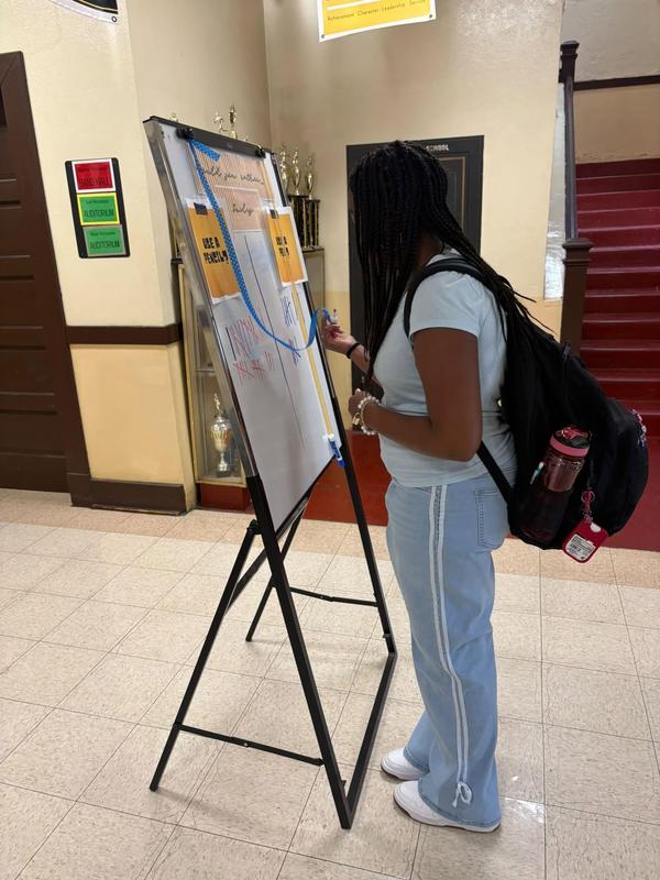 a student votes on Friday