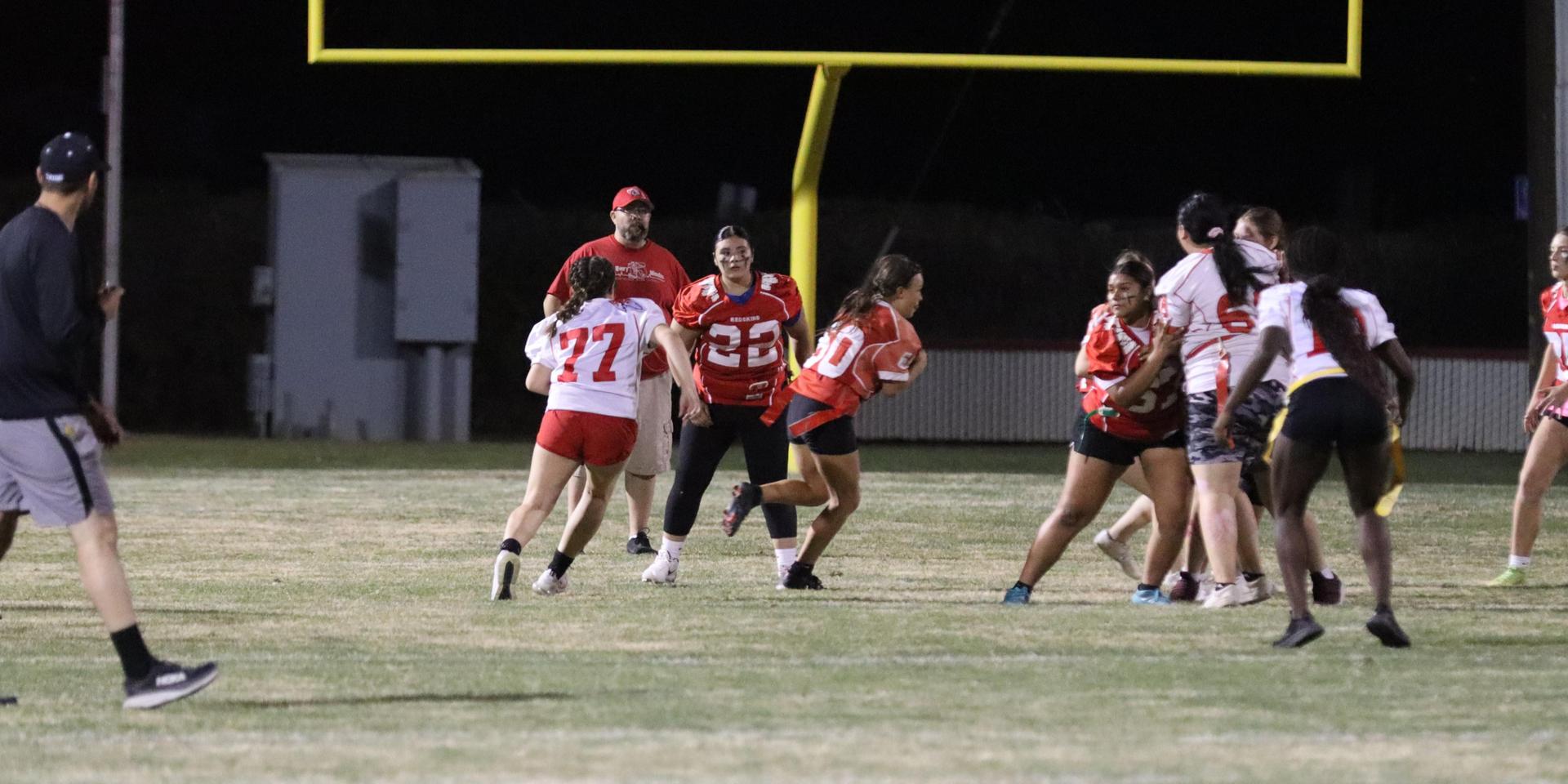 girls playing flag football