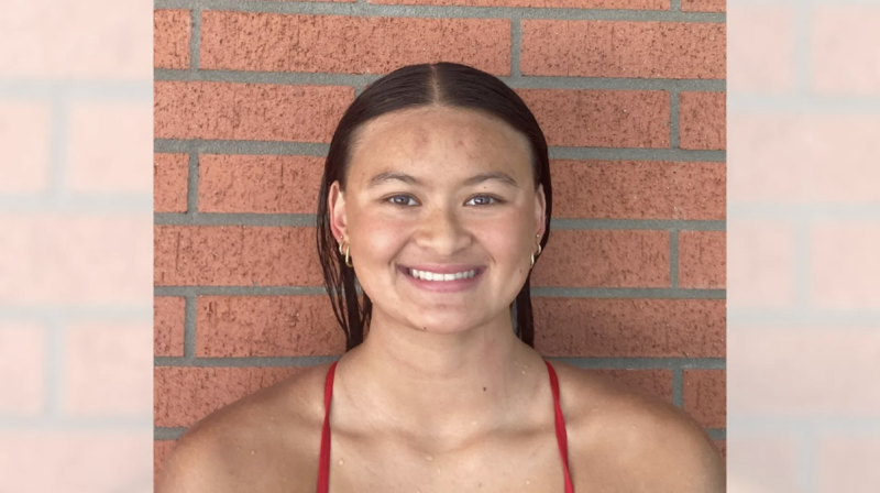 Fountain Valley swimmer Alyssa Ton smiling in front of brick wall