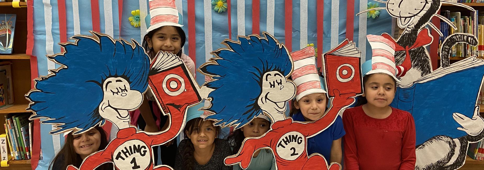 First graders pose with Dr. Seuss and friends!