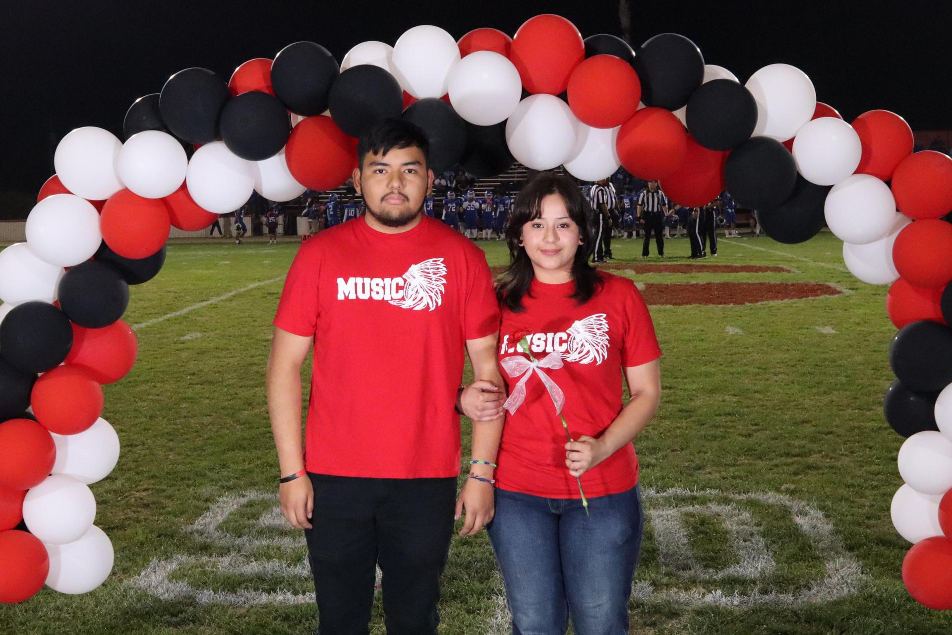 seniors and their escorts celebrating senior night