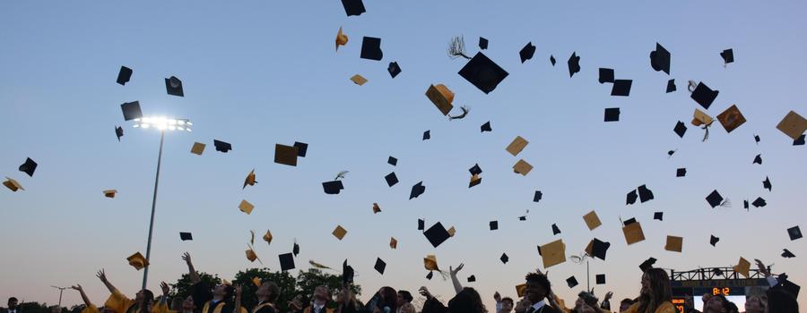 Class of 2026 celebrates by tossing their caps