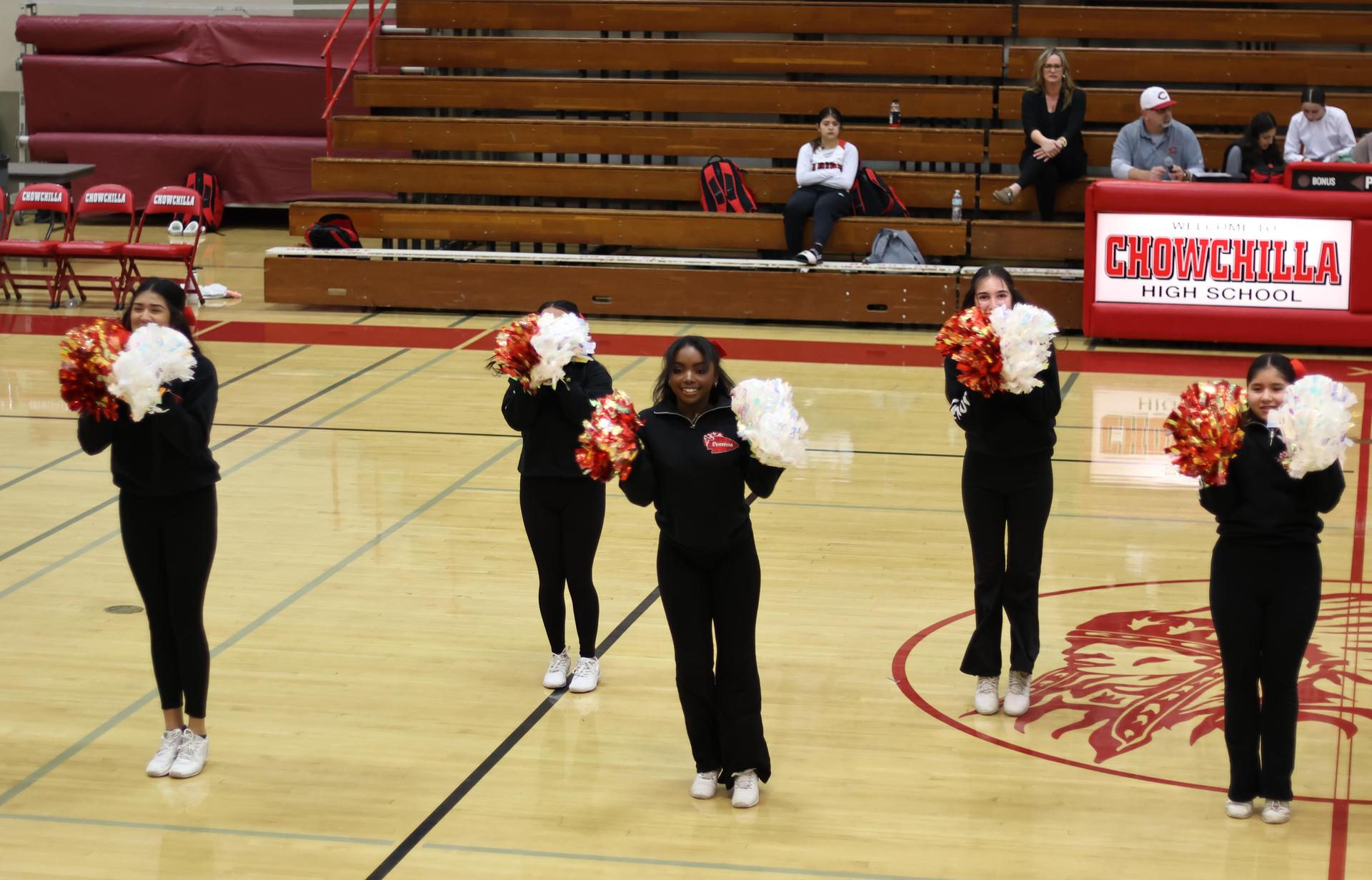 varsity cheerleaders in action