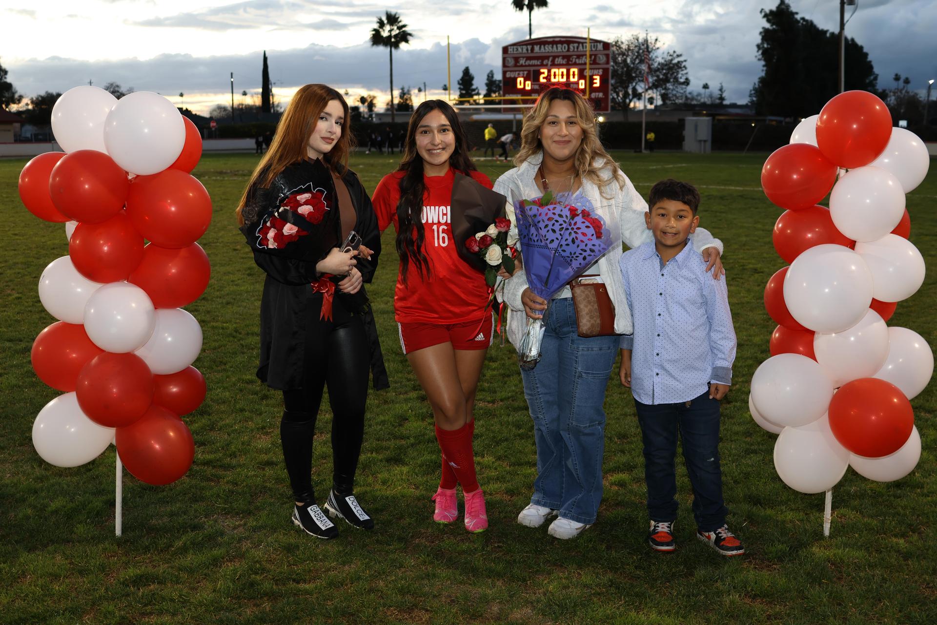 seniors posing with their escorts