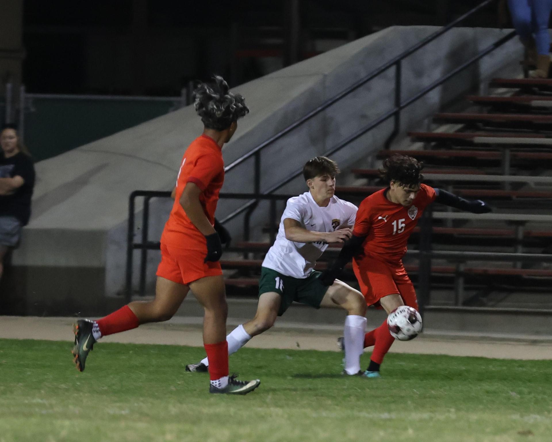 Varsity boys play soccer against Kingsburg