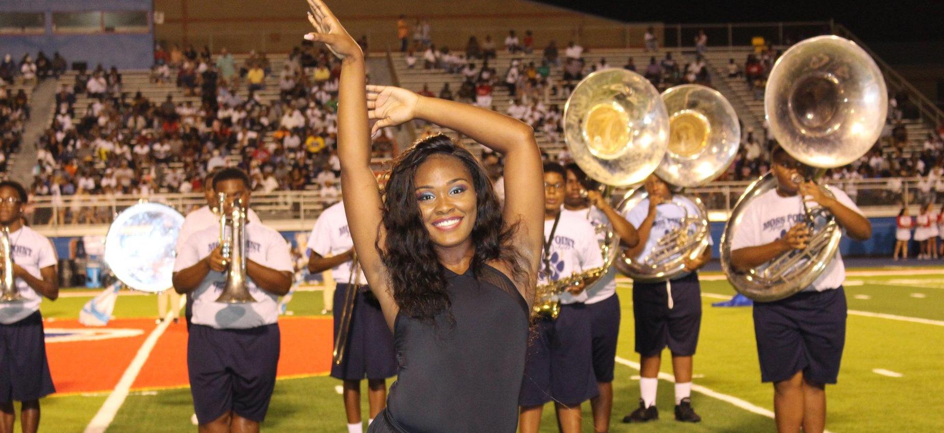 dance girl and band at football game