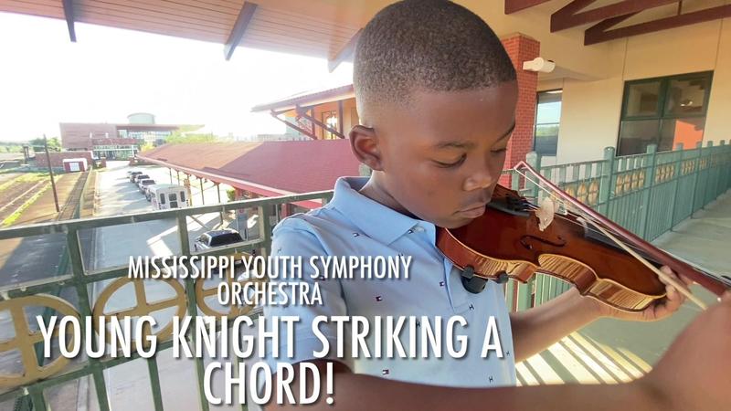 West Lauderdale Elementary Student Lavarus Rue playing the violin